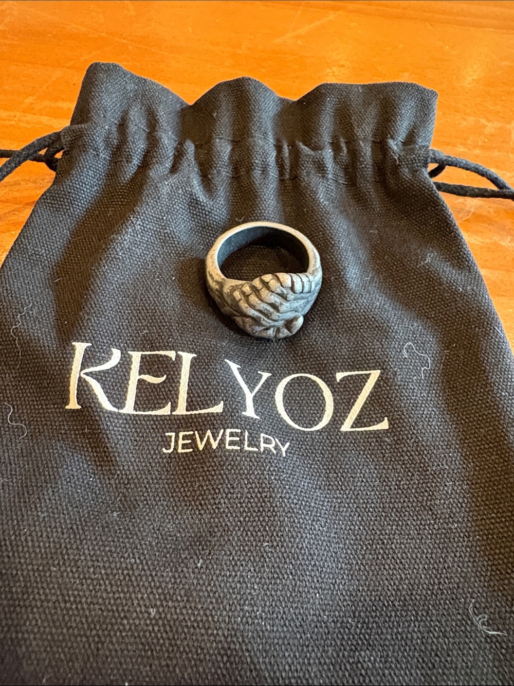 hands shaking Men's Ring